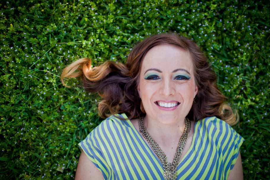 Woman Laying on Spring Grass