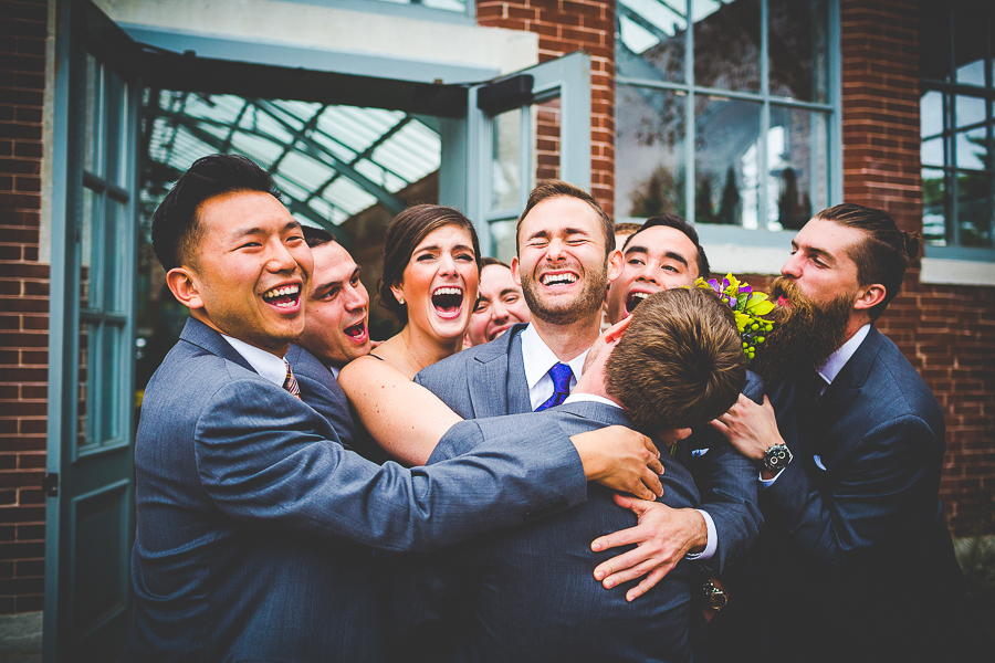 St Louis Botanical Garden Wedding - MO Wedding Photographer - lissachandler.com -12 Bridal Party Hugging Groom, St Louis Wedding