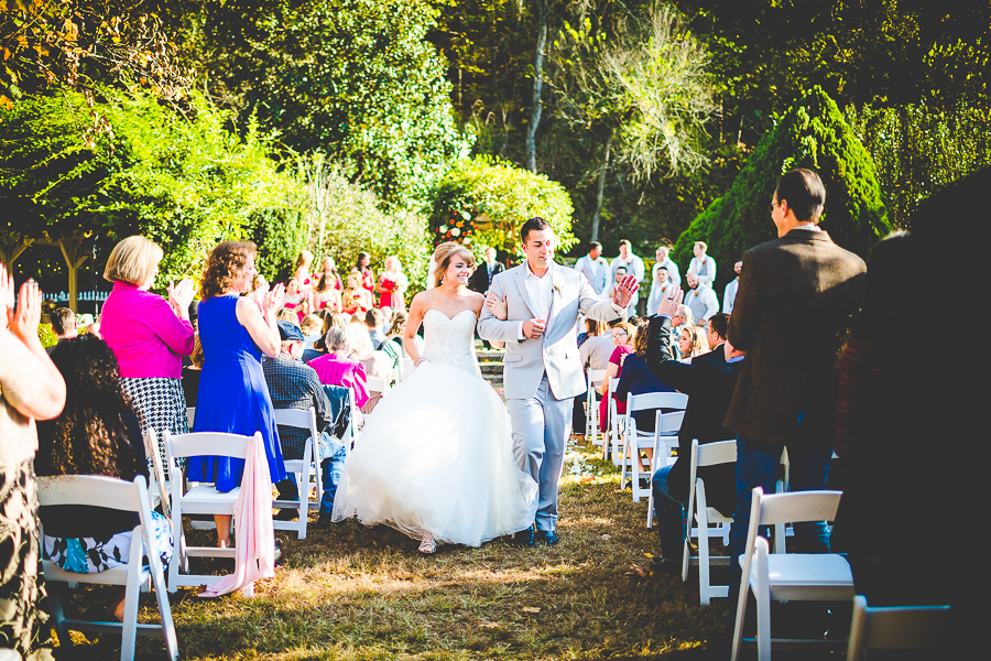 Bride and Groom walking down aisle, Arkansas Wedding Photographer