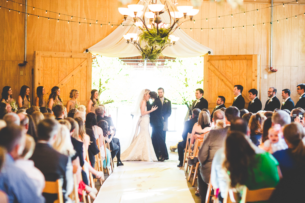 Lauren and JK - Wedding at the Barn at the Springs - NWA Wedding Photographer, lissachandler.com -13 First Kiss at Barn Wedding, NWA Wedding Photographer