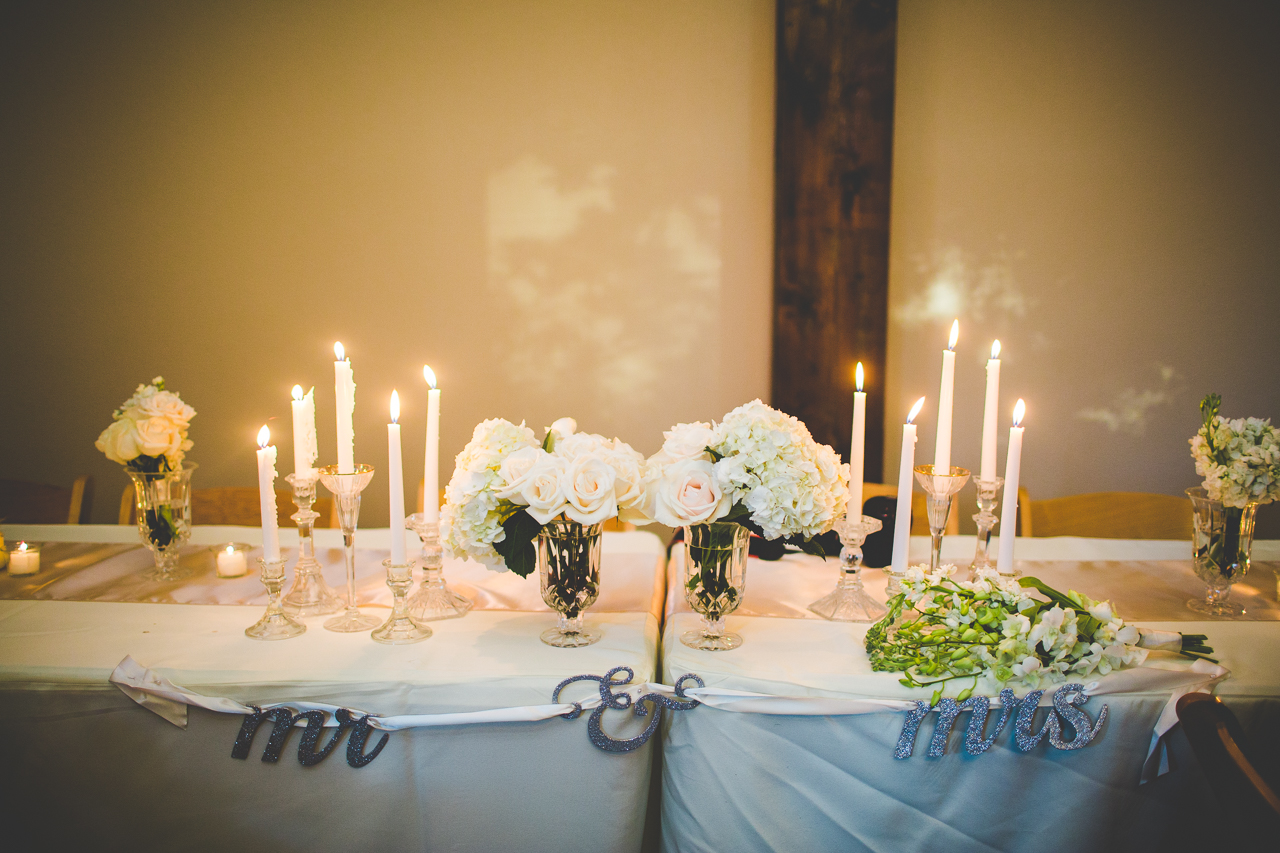 Lauren and JK - Wedding at the Barn at the Springs - NWA Wedding Photographer, lissachandler.com -17 Candles at Wedding Reception, Arkansas Wedding Photographer