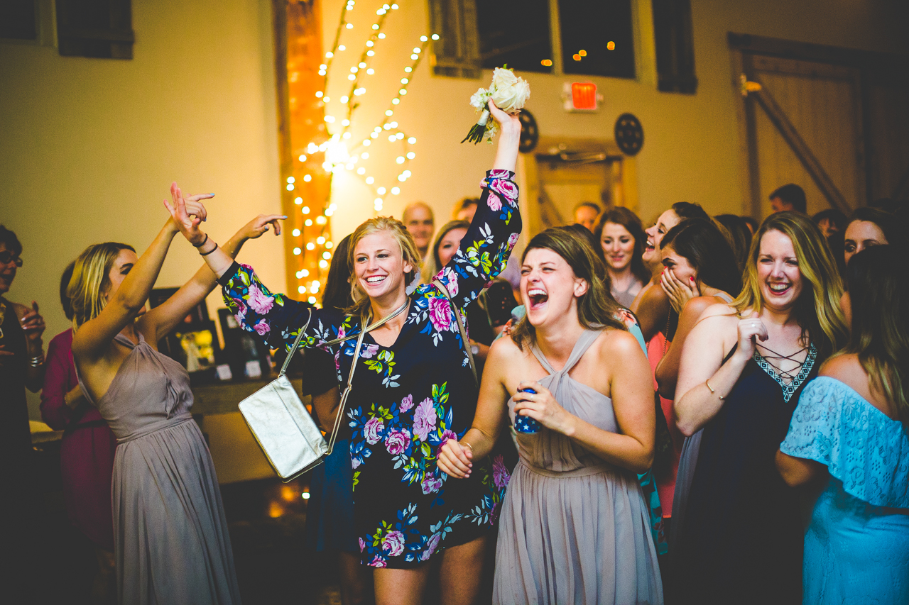 Bouquet Toss at Barn at the Springs, NWA Wedding Photographer