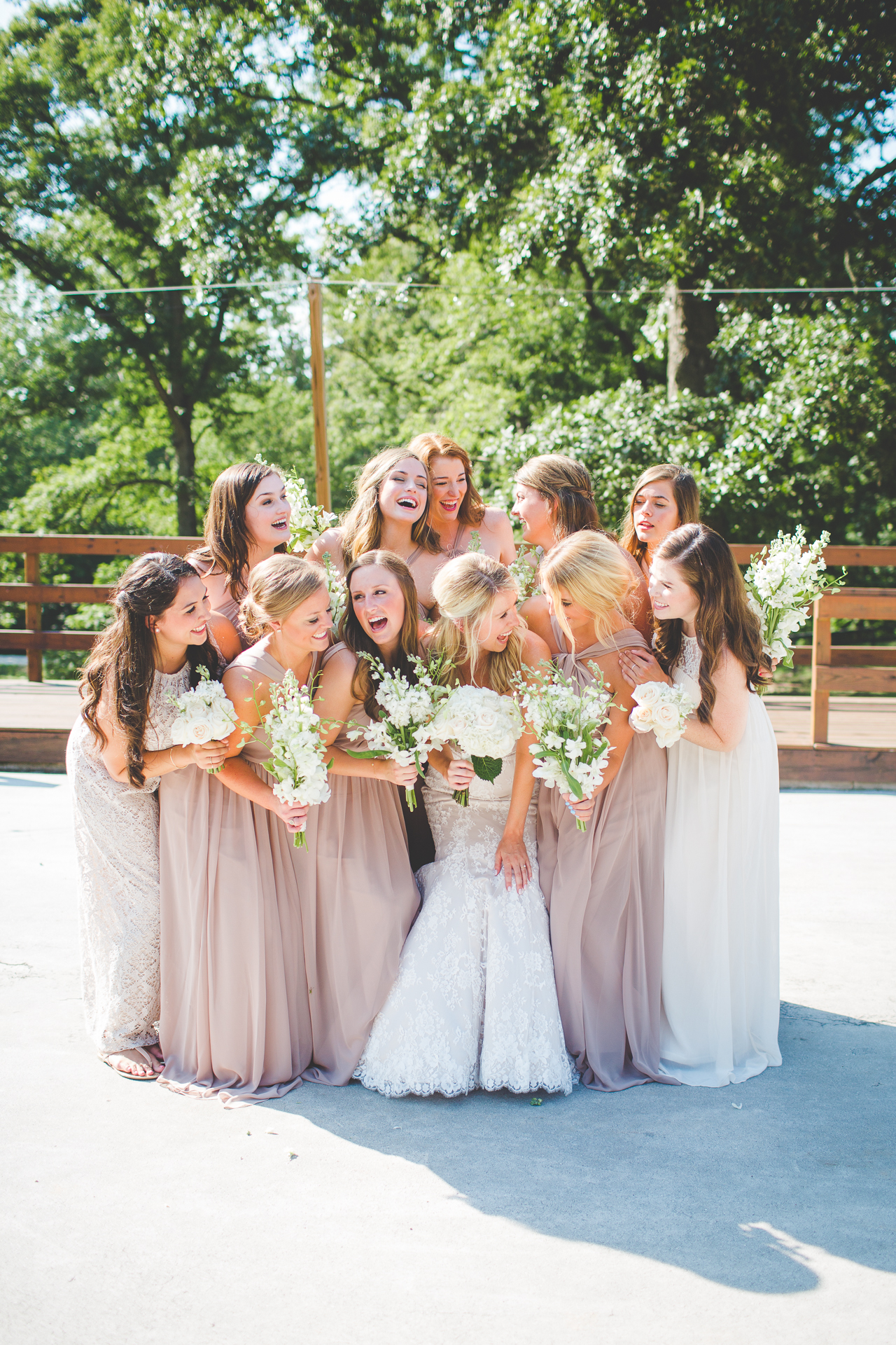 Brides in Neutral Dresses and Simple Flowers