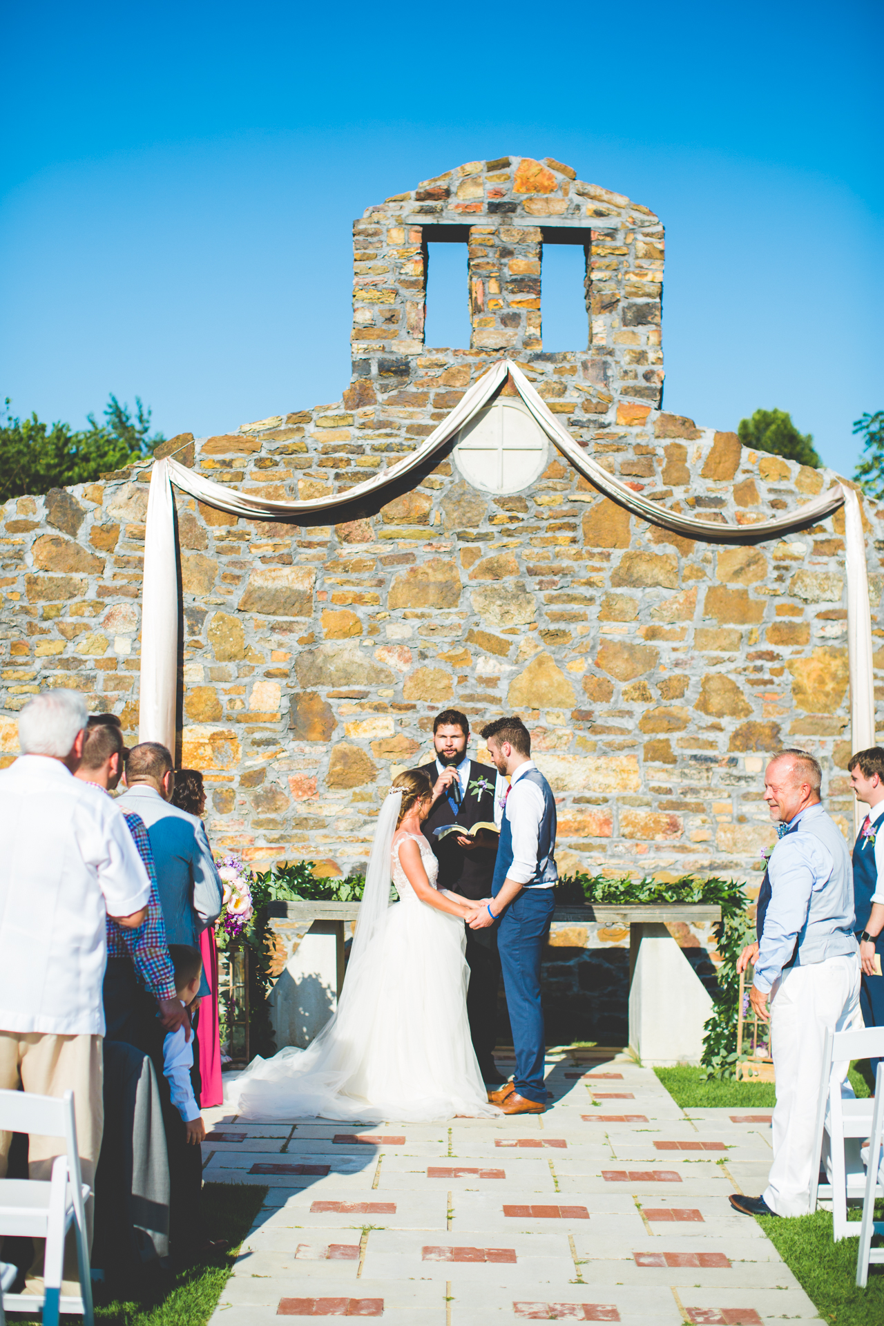 Bride and Groom during wedding ceremony at Sassafras Springs in Springdale