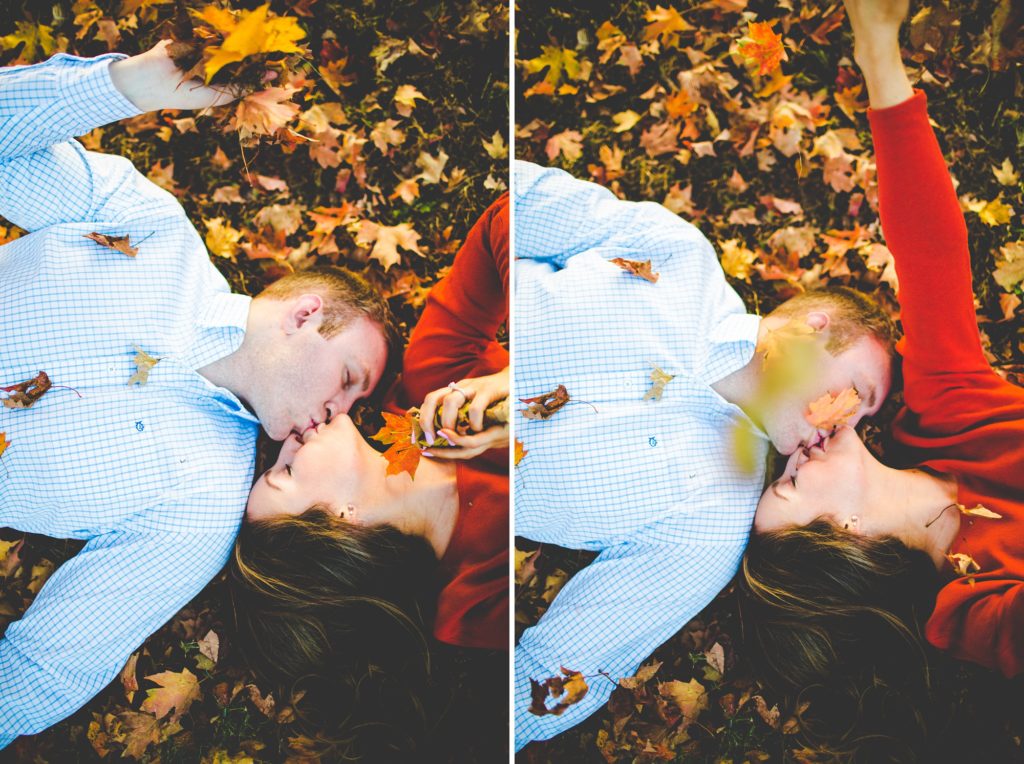 couple throwing leaves at engagement session