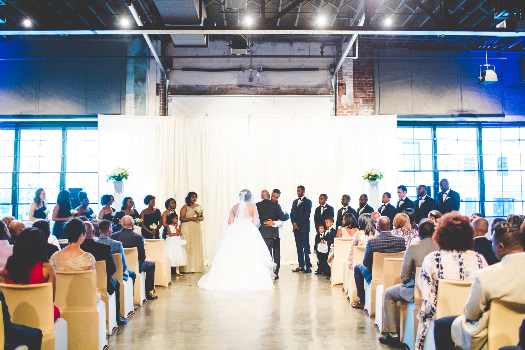 Bride walks down aisle, Bentonvilel Arkansas Wedding Photographer