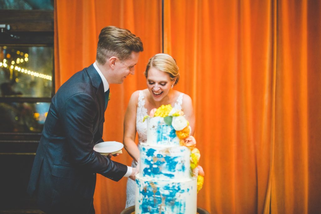 bride laughs during cake cutting, brooklyn wedding at my moon NYC
