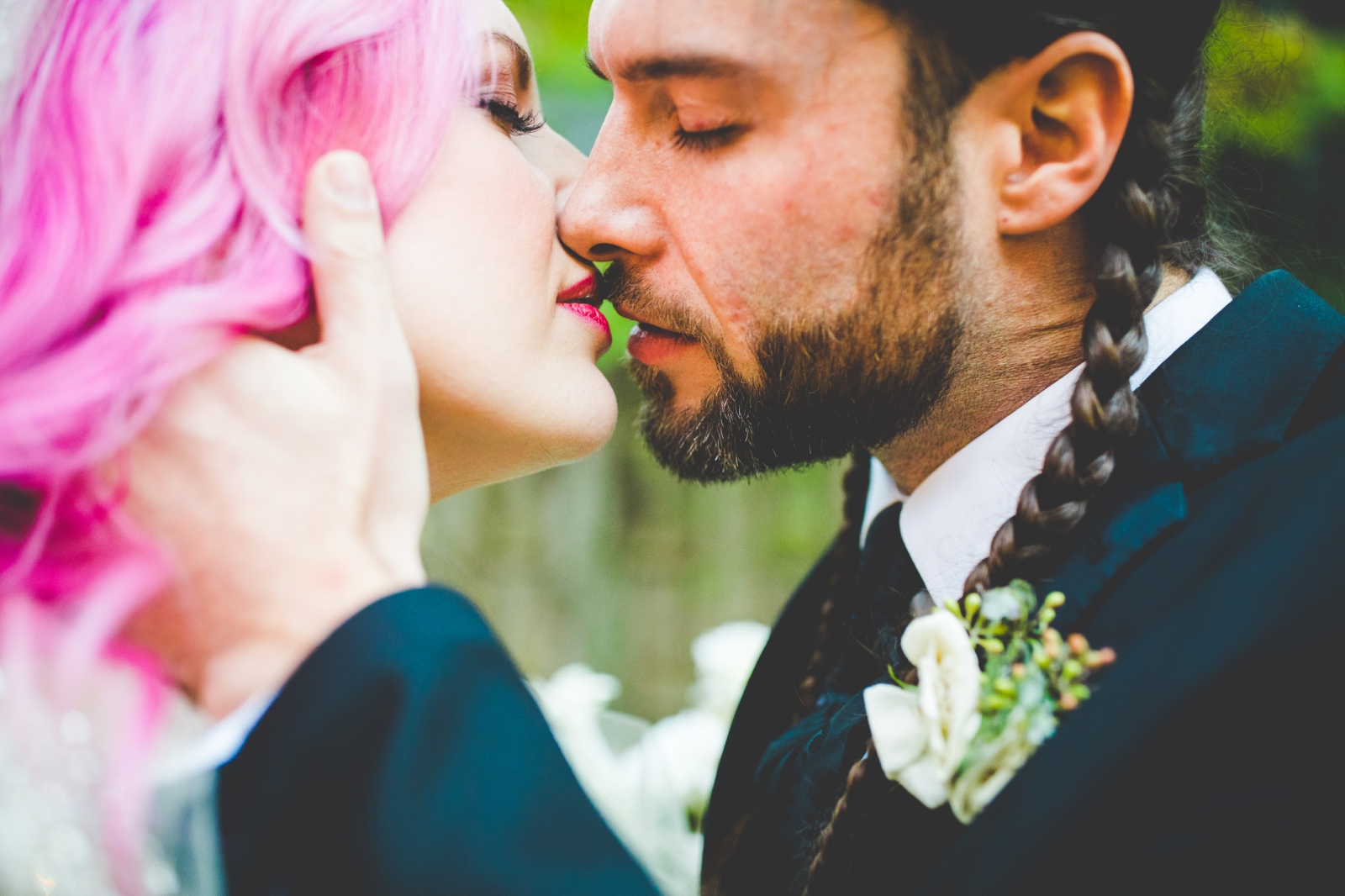 pink haired bridal, bride and groom kiss