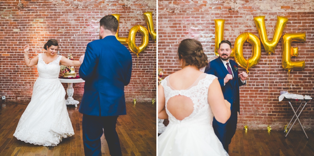 bride and groom dance by love balloons