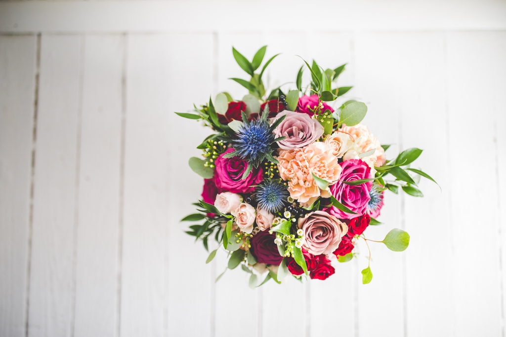 Rich color palette at fall wedding in Arkansas, bouquet by Fleurish NWA