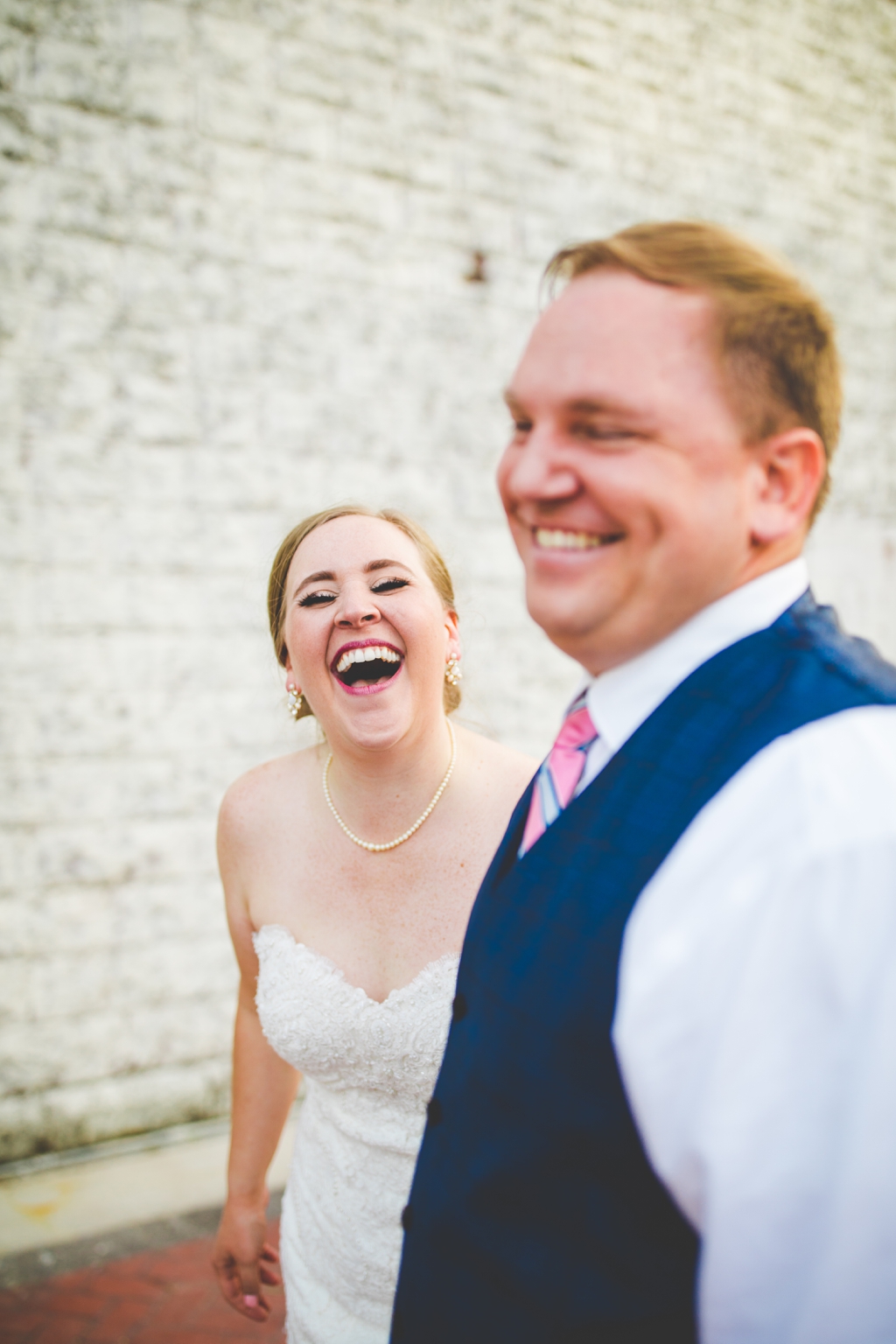 bride laughing on wedding day