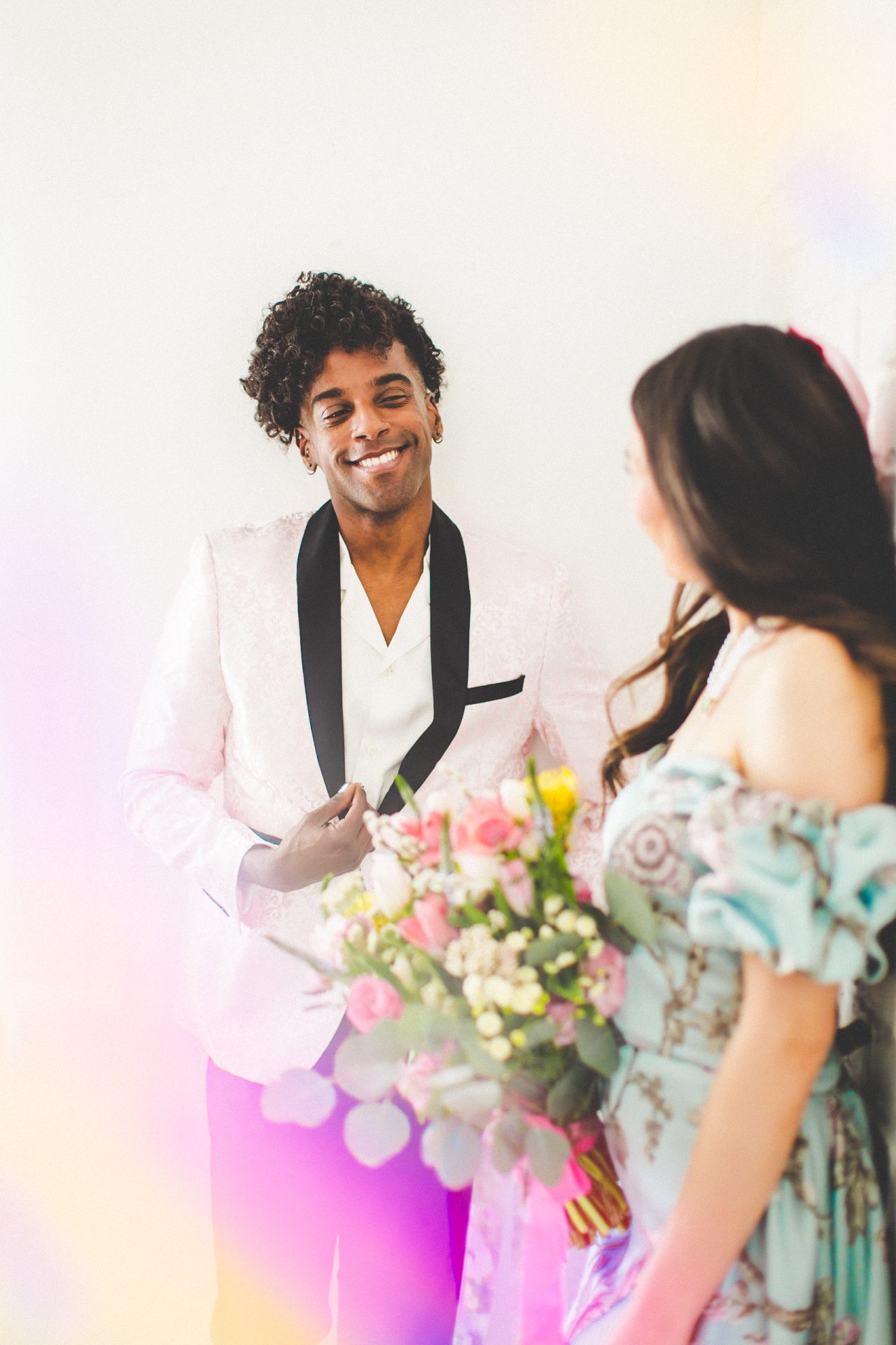Groom Smiling at Bride in Blue Wedding Dress