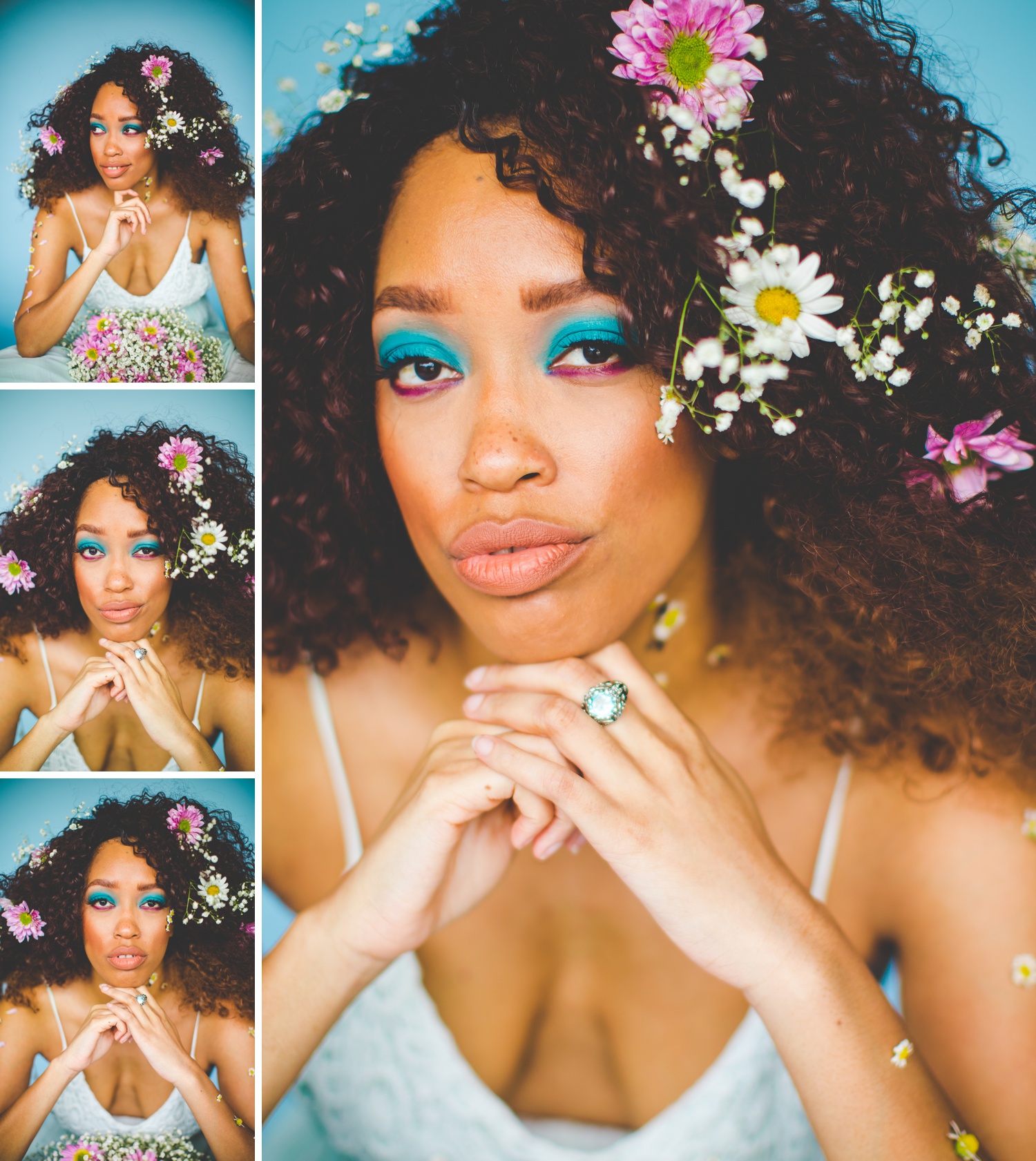 electric blue eyeshadow, colorful blue studio portraits of model with flowers in her hair