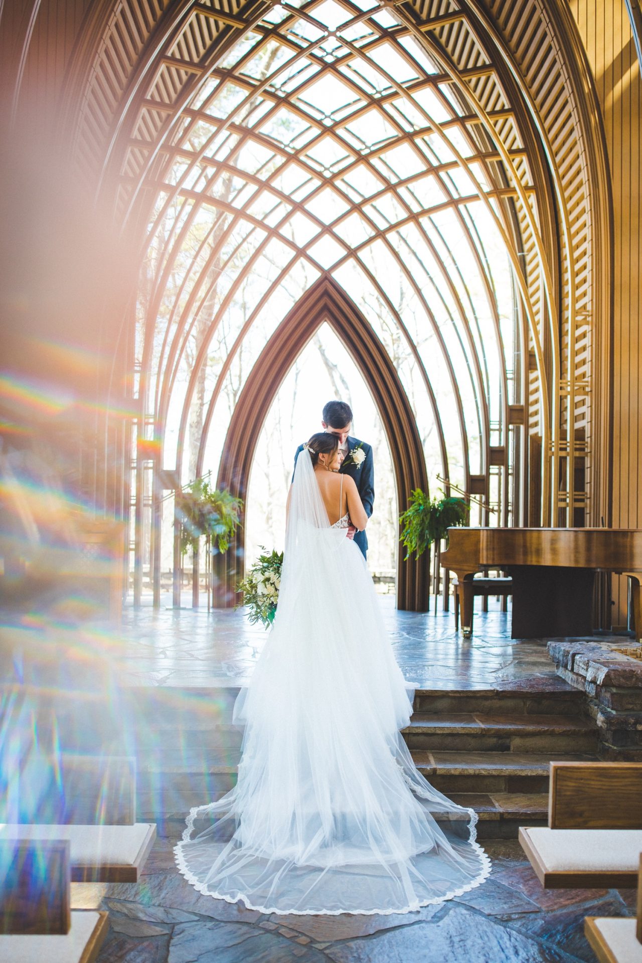 beautiful bride and groom portrait taken at Cooper Chapel in Bella Vista