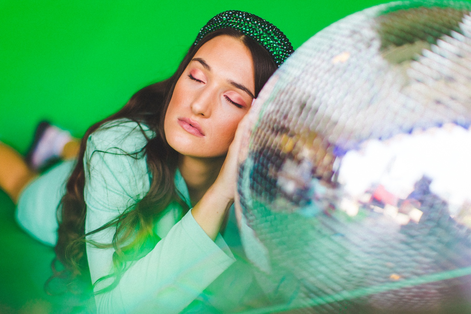 creative and whimsical green editorial photos with disco ball