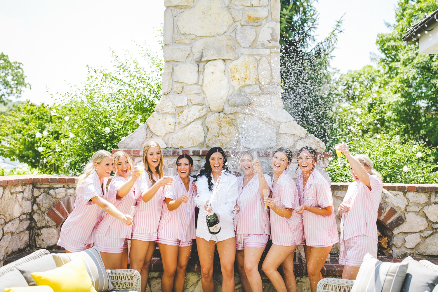 Bridesmaids Popping Champagne on Wedding Day, Big Cedar Lodge Summer Wedding