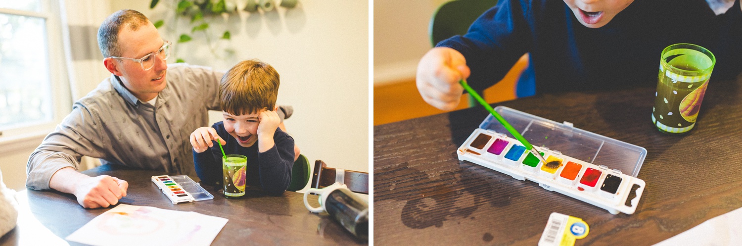 family painting during family photographs in Fayetteville ar