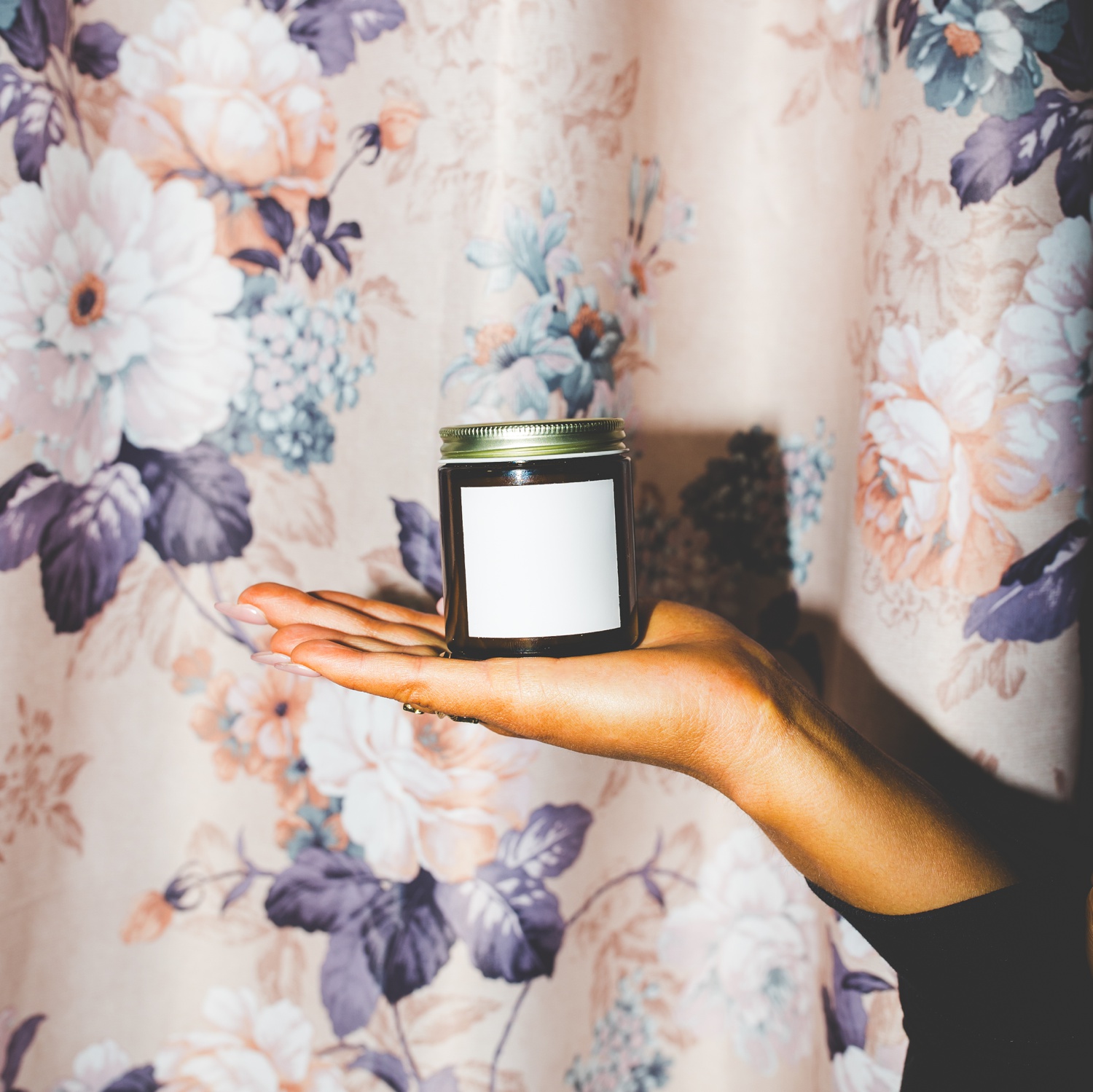 mockup photograph of 4 oz soy candle in amber colored jar