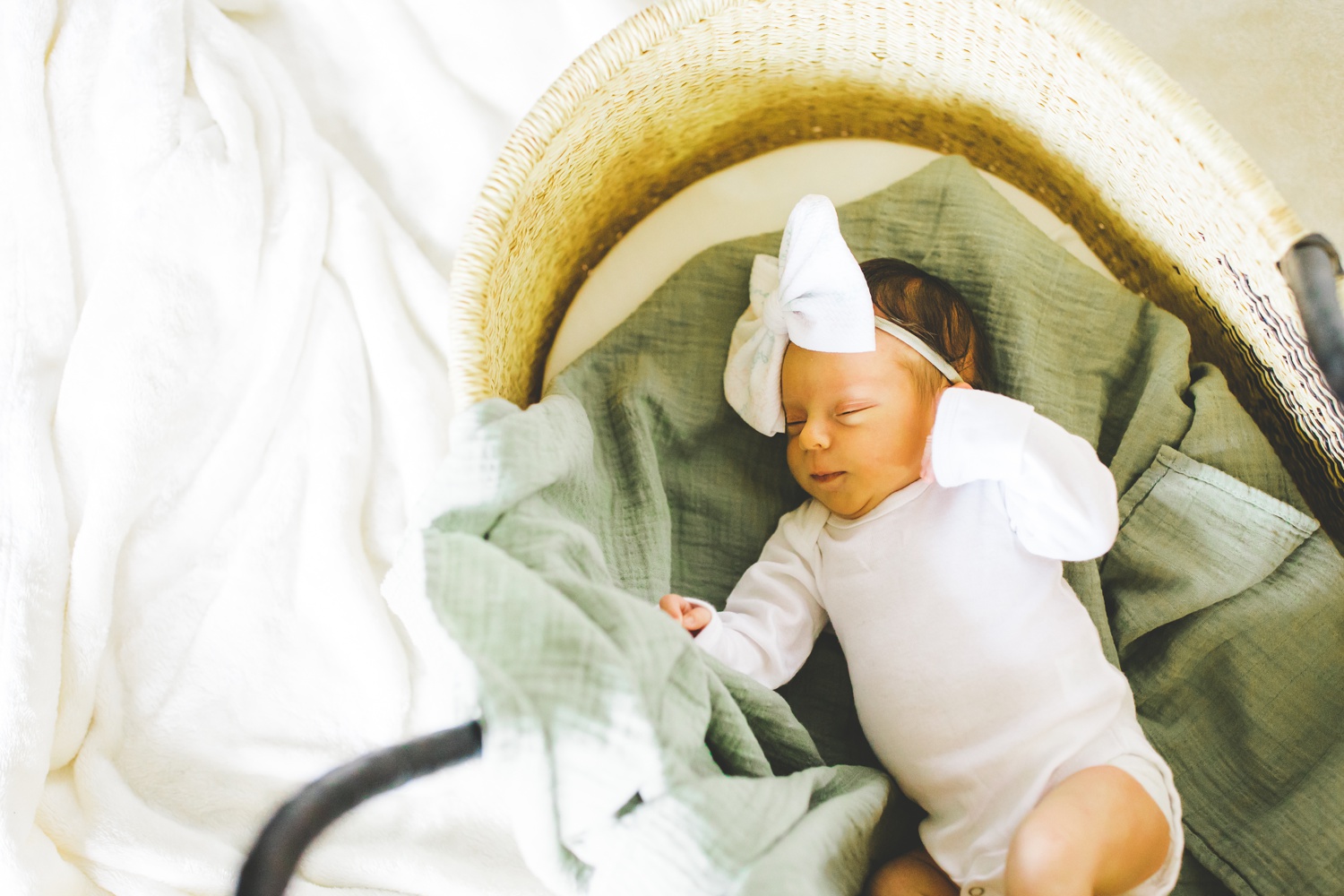 newborn photos in cute woven basket, Northwest Arkansas baby photographer 