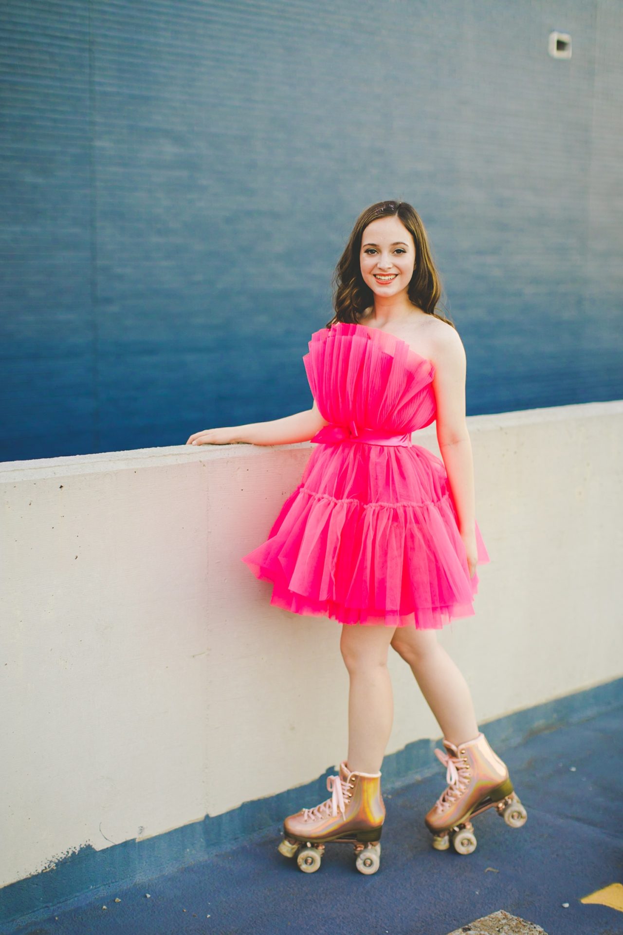 high school senior photographs with hot pink dress