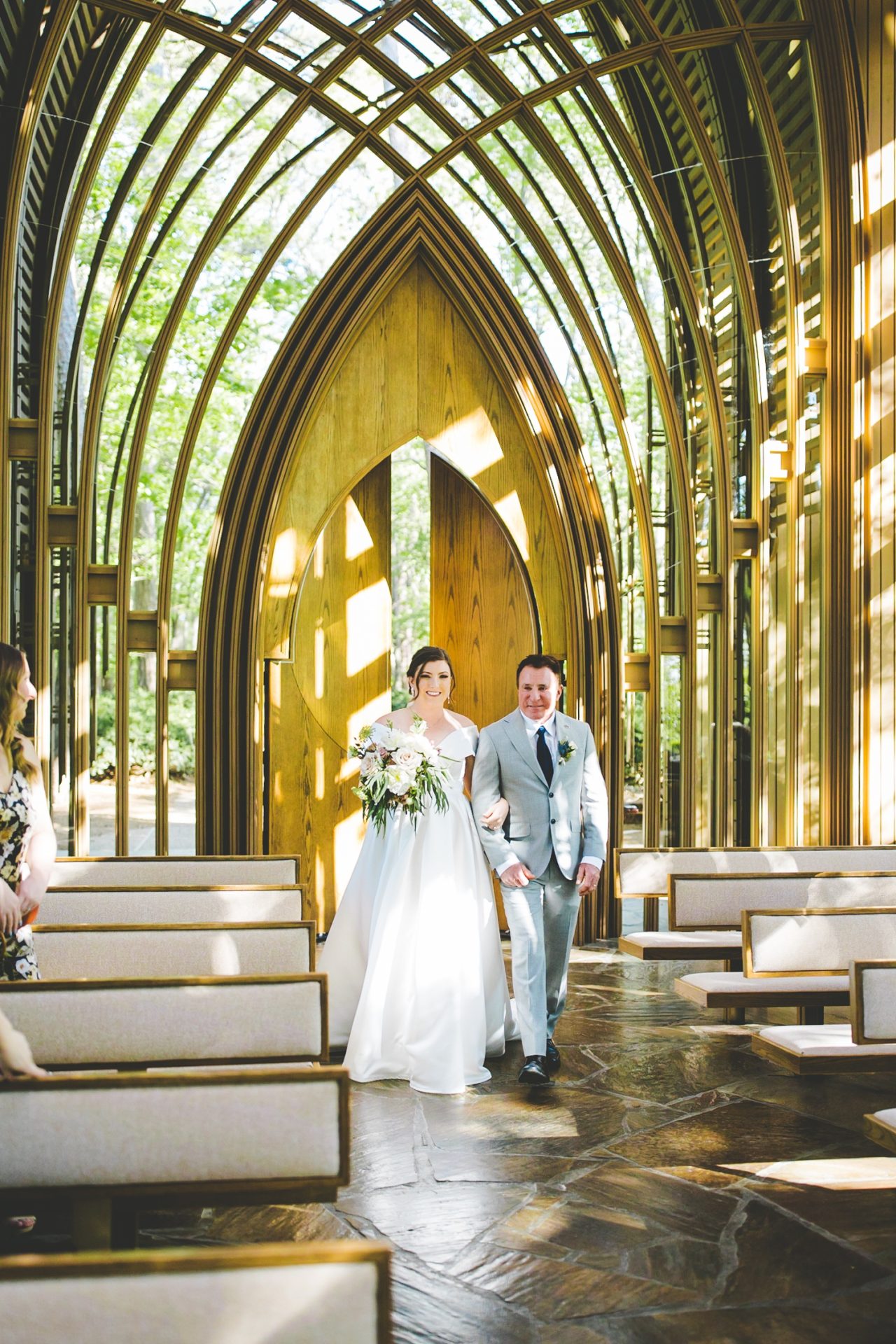 Bride Walks Down Aisle at Cooper Chapel Glass Chapel in Arkansas 