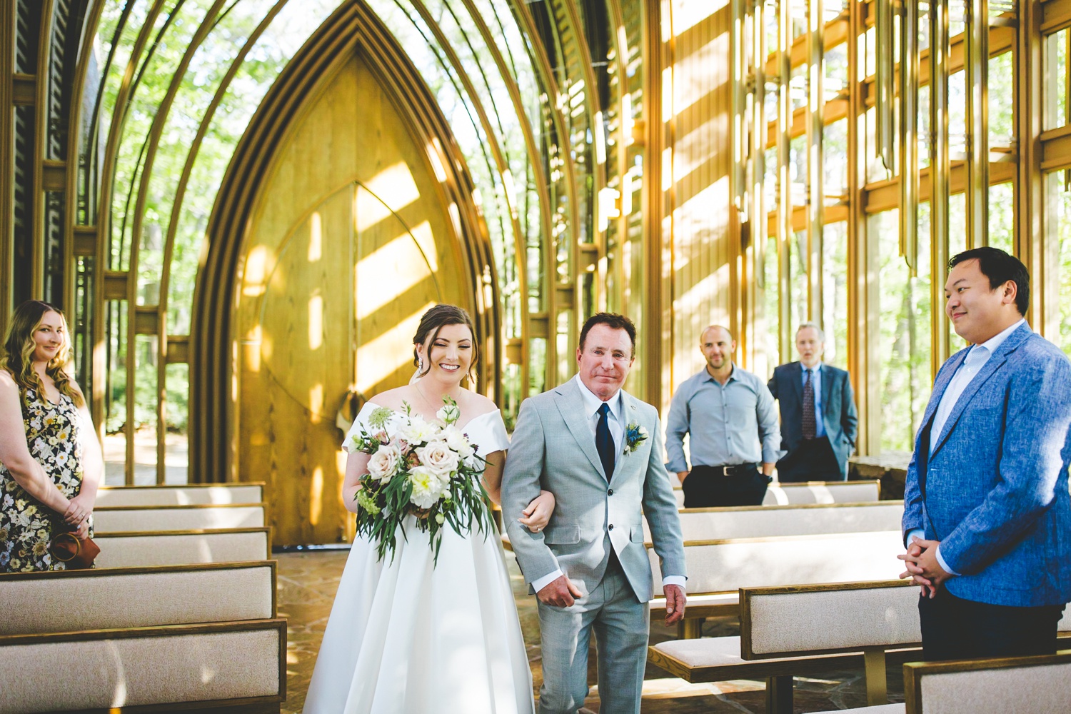 Bride Walks Down Aisle at Cooper Chapel Glass Chapel in Arkansas 