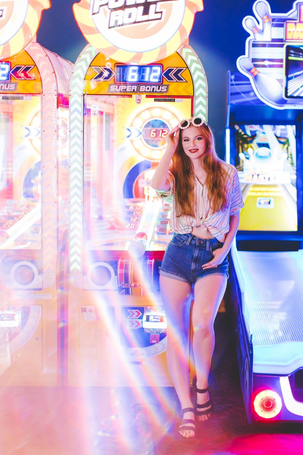 senior photographs taken in an arcade 