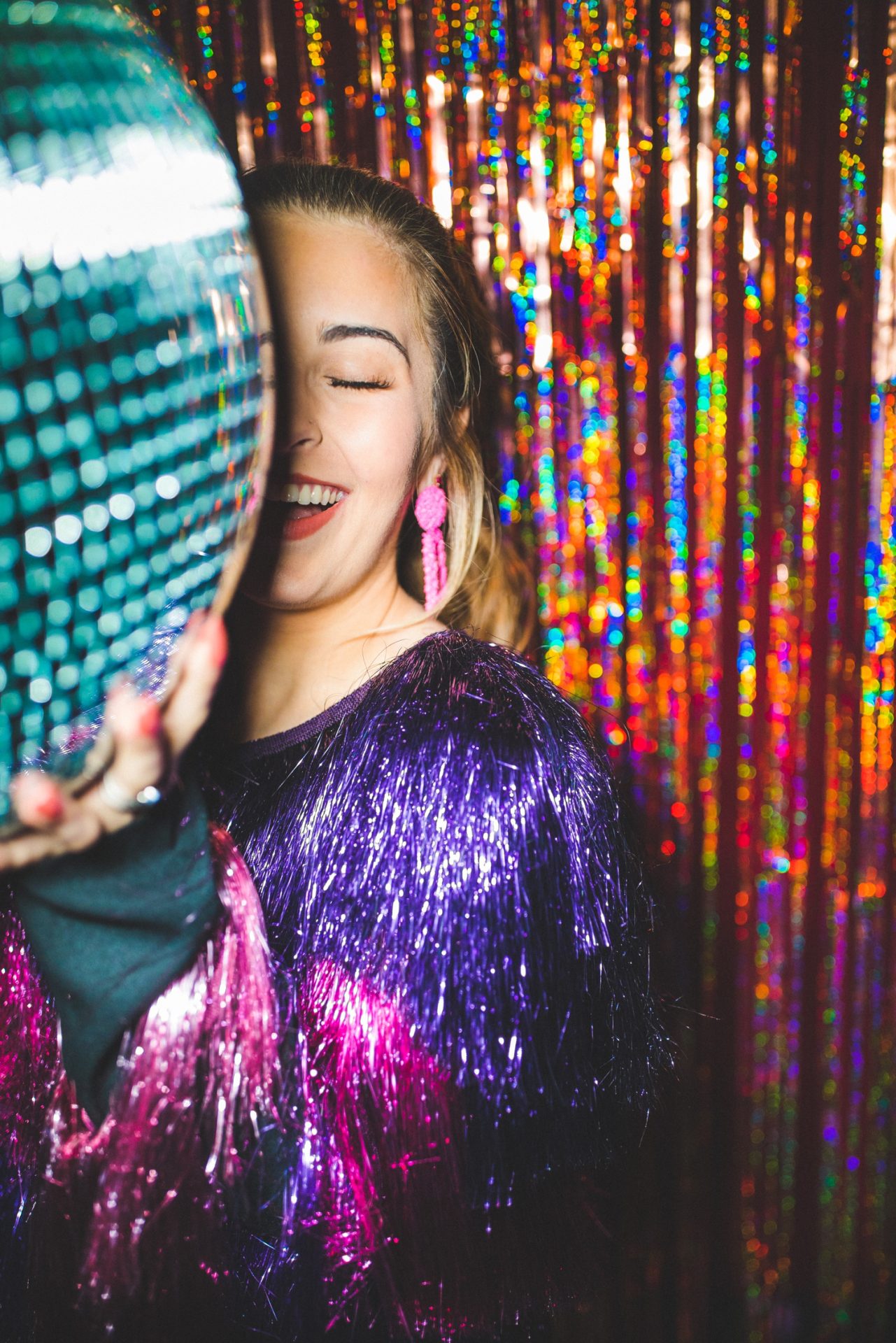 colorful senior photographs with tinsel, Northwest Arkansas senior photographer, studio senior photos